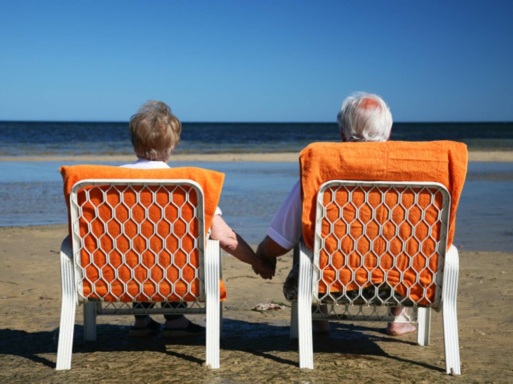 Couple in beach chairs